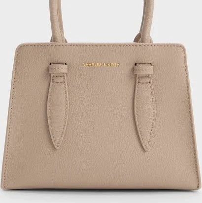 bag Charles & Keith Allyn Structured Trapeze Tote Bag charleskeith.com $103
