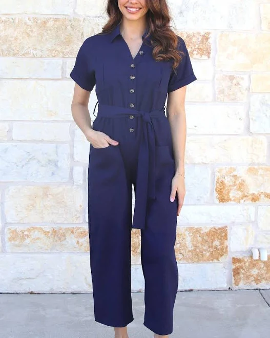 Short-sleeve utility jumpsuit with a cinched elastic waist and cargo pockets