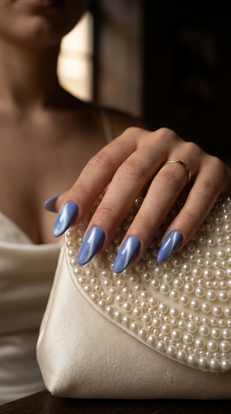 Fun Summer Nails 2026: Mystic Periwinkle Cat-Eye Mysterious periwinkle cat-eye nails for fun summer nails 2026. Ideal for date nights and special occasions.