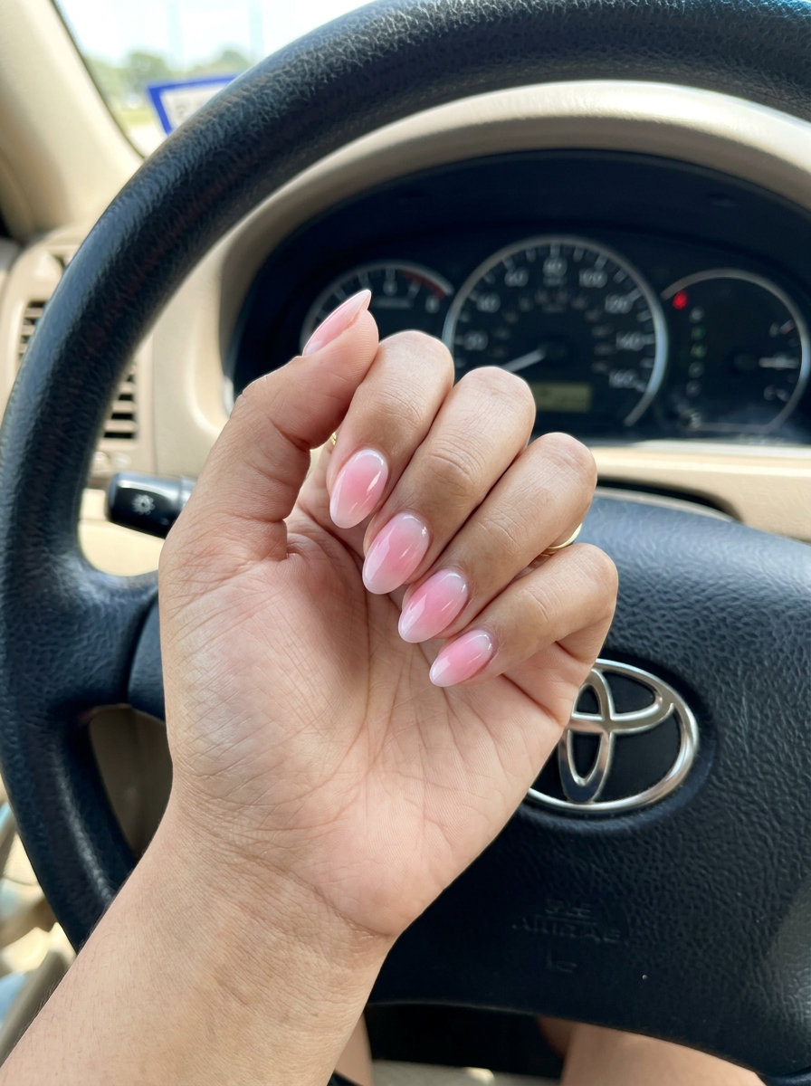 Short gel nails summer 2026: Peach Fuzz Aura Gradient on soft almond nails. Ethereal date night look.