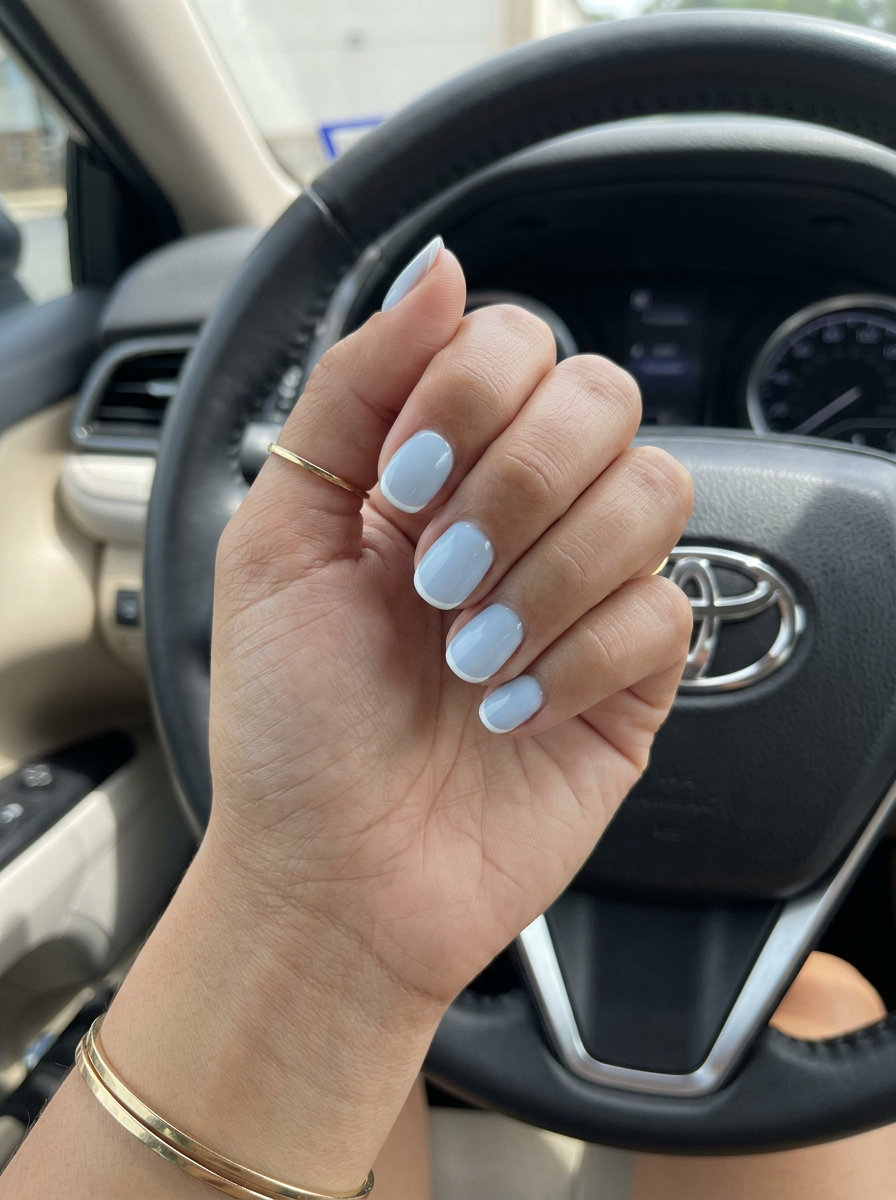 Short round summer nails 2026: Milky Blue Micro French for daily wear and work.
