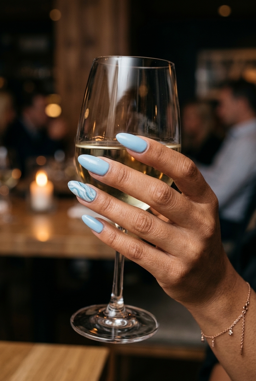Oceanic Marble Dream Oval nails: sky blue with white & blue marble. Chic summer classy nails 2026.