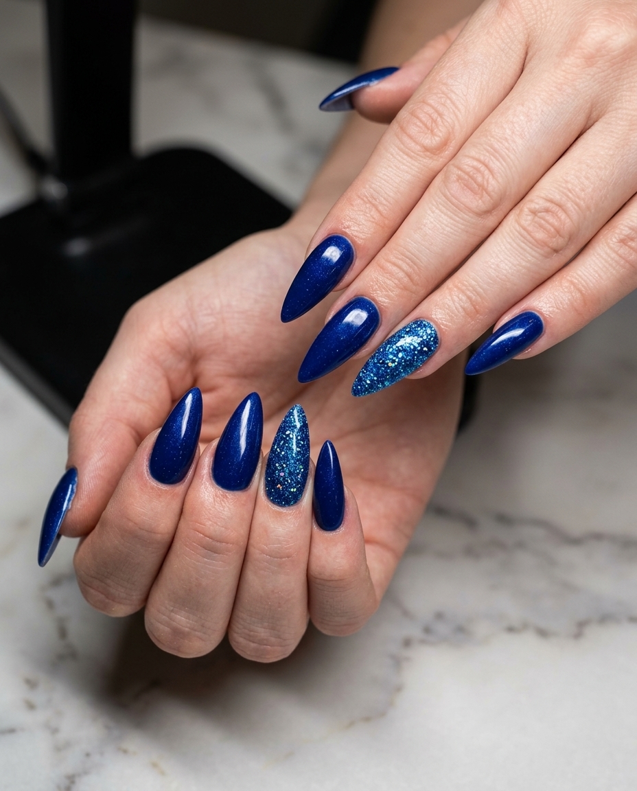 Summer Holiday Nails 2026: Bold Cobalt Glitter Bomb Oceanic Glitter Bomb Accent nails: deep cobalt blue with iridescent blue glitter for party.