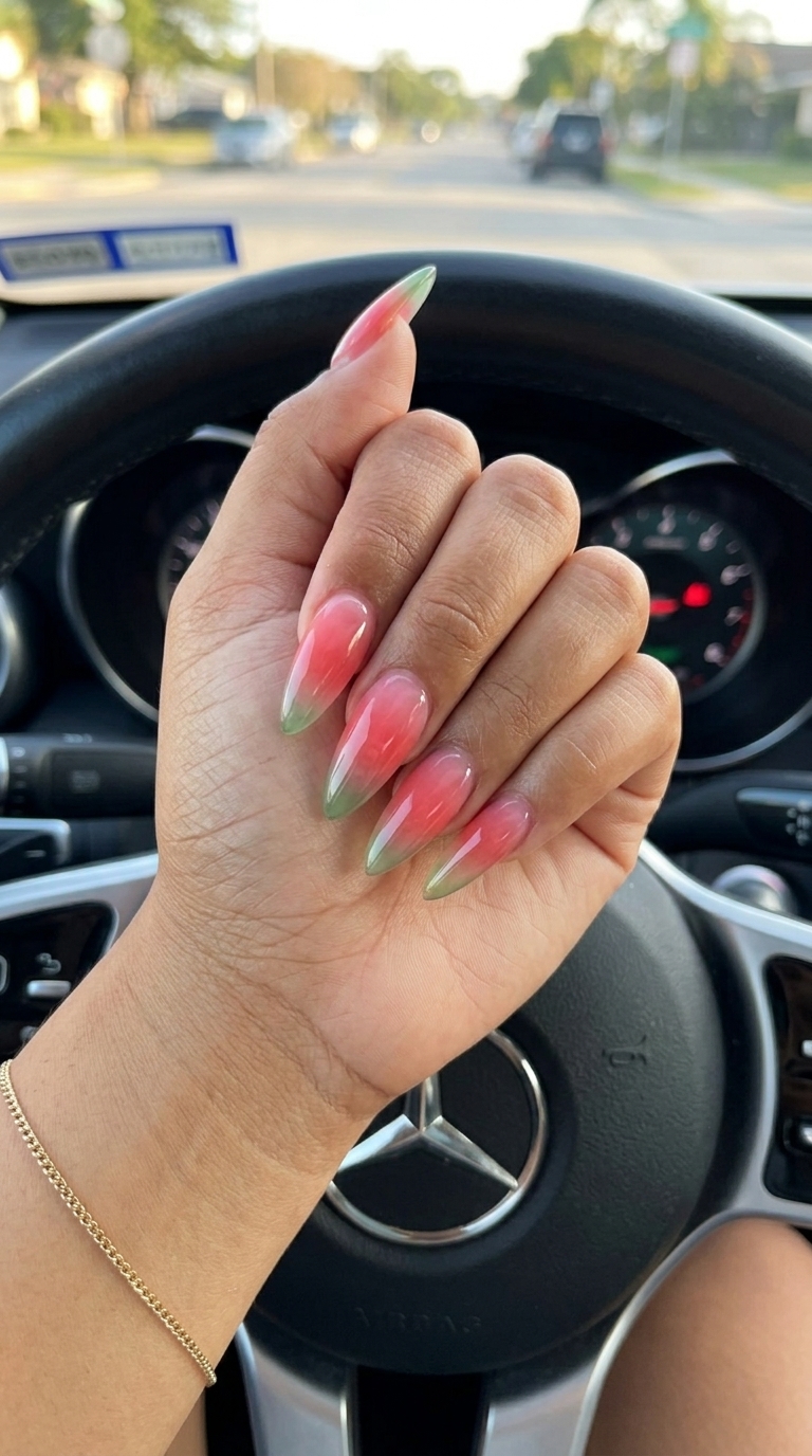 Summer Fruit Jelly Fade nails: translucent watermelon pink, green, and yellow ombre gel polish for vacation.