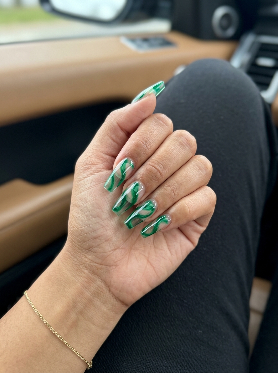 Jelly swirl abstract nails for summer 2026 party outfits. Edgy, artistic, and playful.