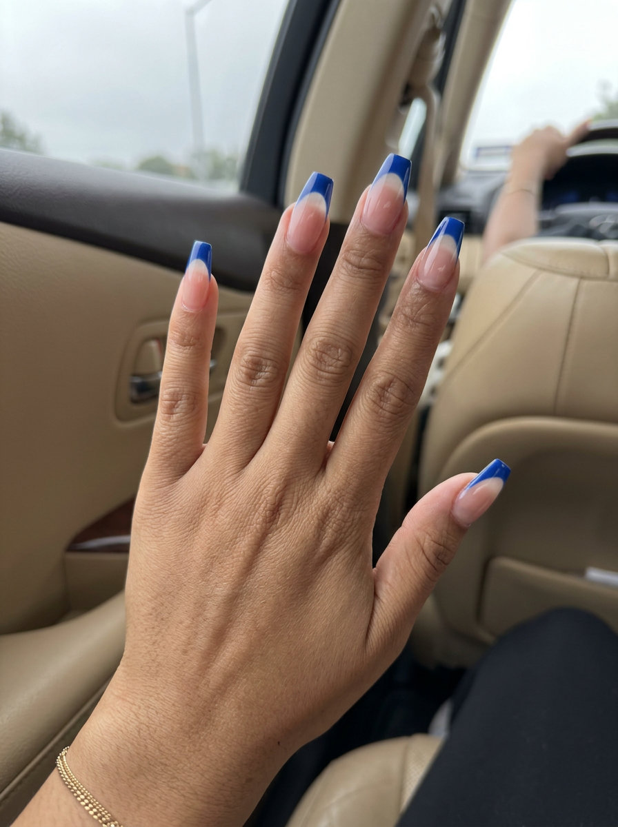 Cobalt French Coffin Nails 2026: Edgy Party Style Edgy cobalt blue French tip coffin nails for summer nails coffin 2026 party outfit. Modern, bold look.