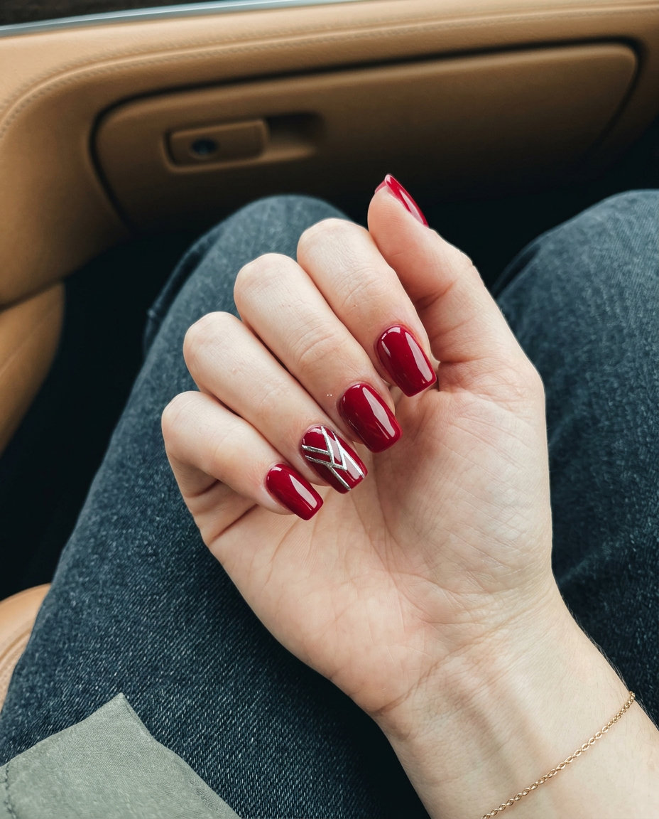 Ruby red nails with chrome accents for summer 2026 daily wear and sophisticated dinners.