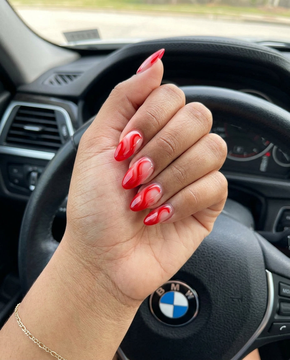 Scarlet swirls aura nails for summer 2026 festivals and casual outings. Artistic summer red nails.