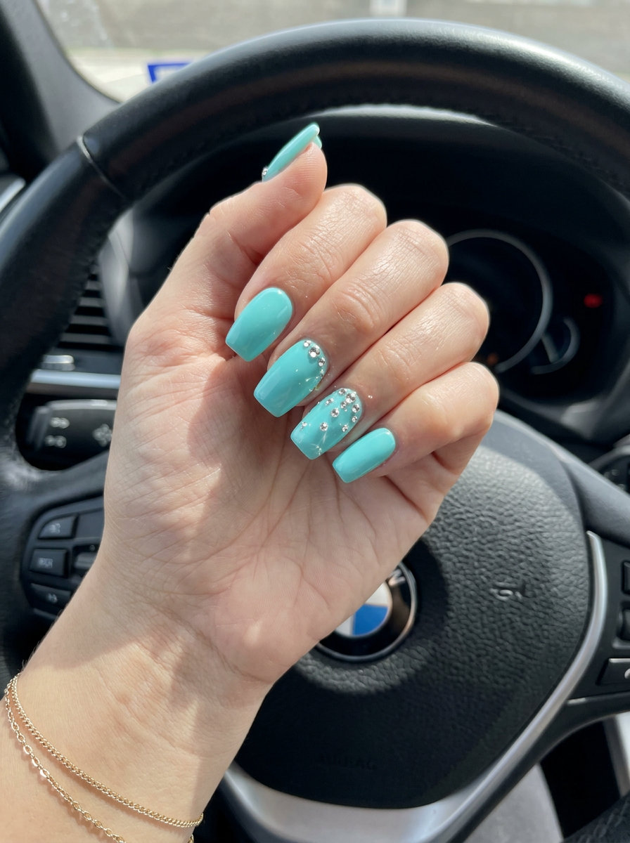Vivid Aqua Rhinestone Nails 2026 | Glam Vacation Style Vivid Aqua Rhinestone Accents nails: bold aqua with sparkling clear rhinestones for vacation nails summer 2026.