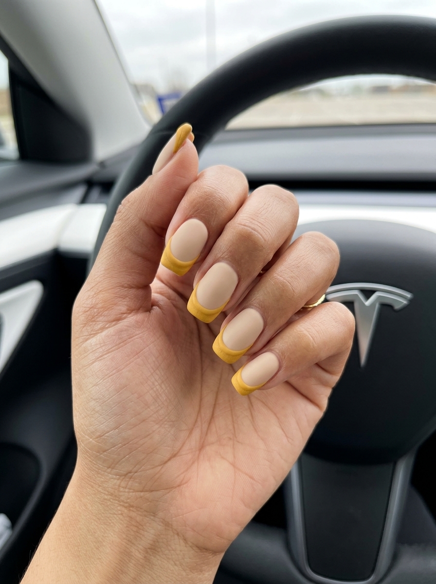 Sophisticated matte mustard yellow textured French tip coffin nails for daily wear or brunch. Yellow summer nails 2026.