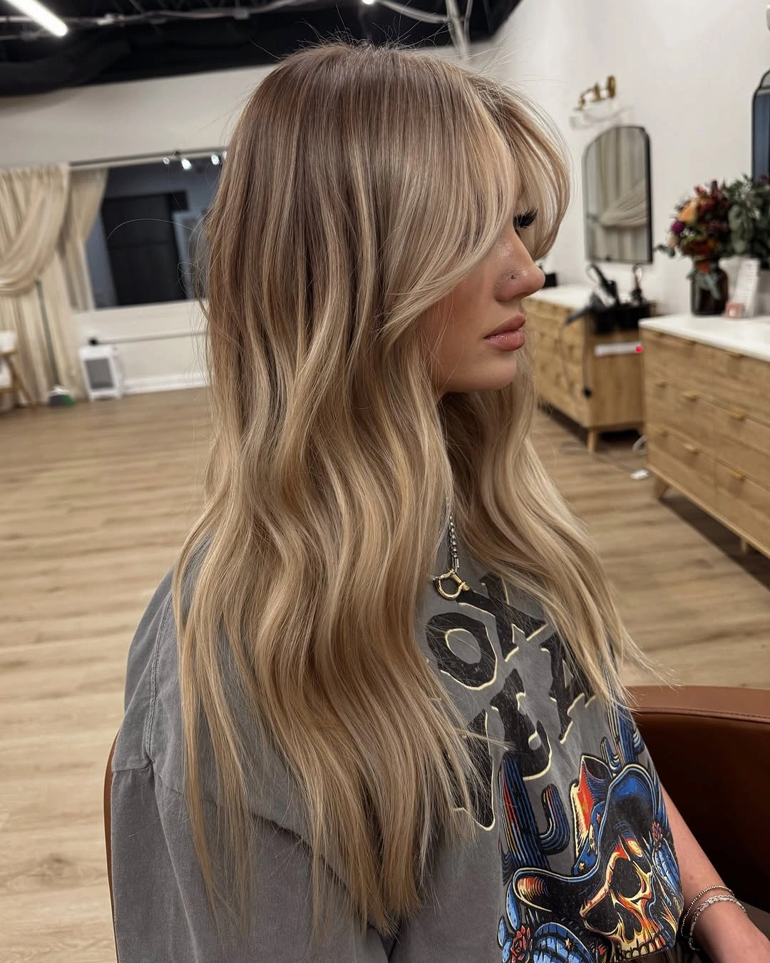 babylights hair ideas Long Layered Blonde Babylights With Curtain Bangs