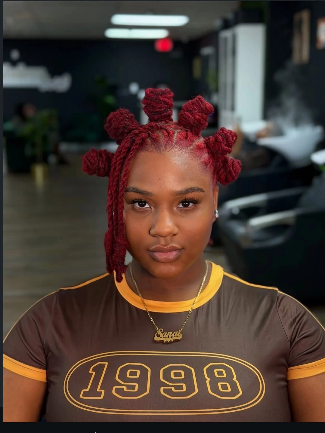 bantu knots hairstyles Bold Burgundy Bantu Knots With Twist Texture
