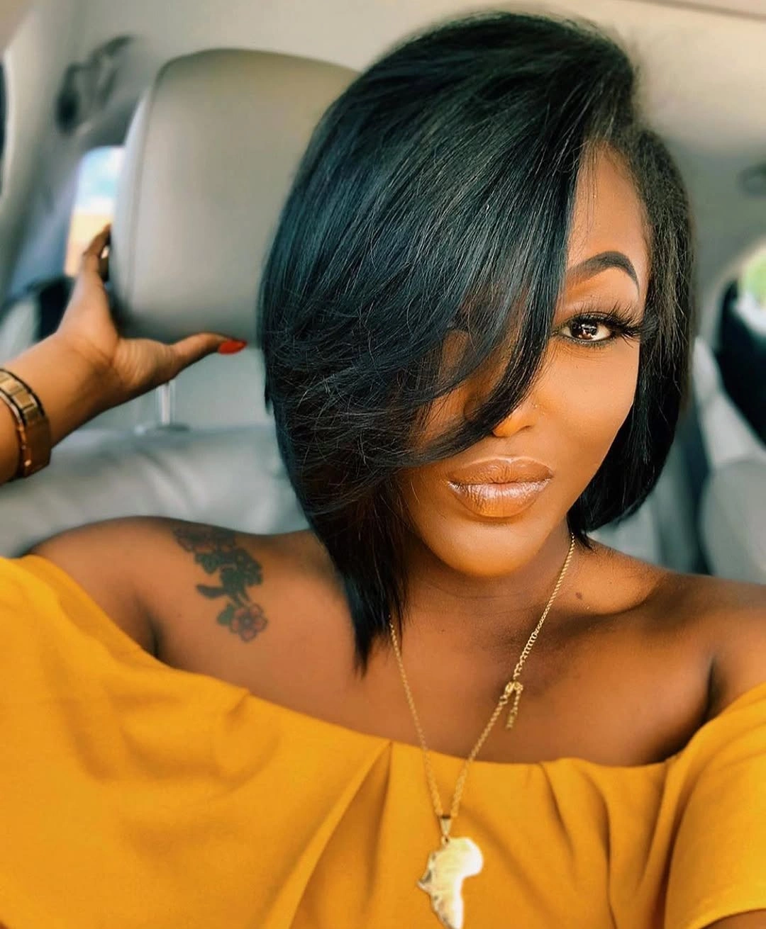 bob hairstyles for black women Angled Glam Bob With Dramatic Side Fringe