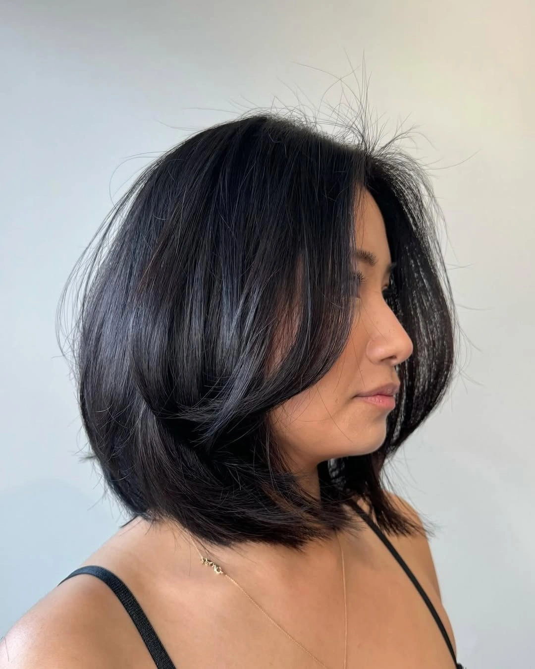 bobbed haircut for women Layered Black Bob With Soft Volume