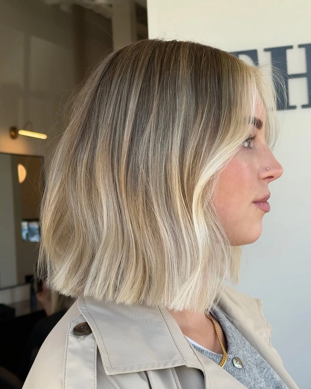 bobbed haircut for women Bright Blonde Blunt Bob With Effortless Texture