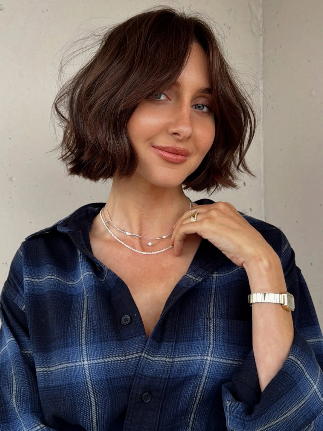bobbed haircut for women Soft Chocolate Bob With Wispy Curtain Bangs