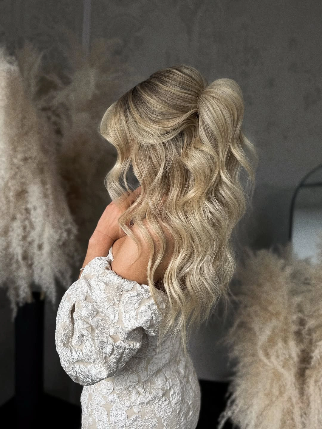 body waves hairstyle Voluminous Blonde Half-Up Waves for Special Moments