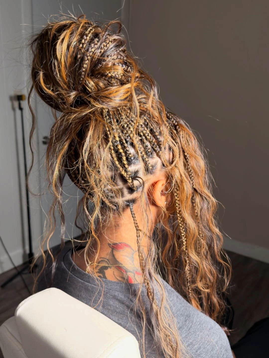 bora bora braids hairstyle Relaxed High Bun With Effortless Texture