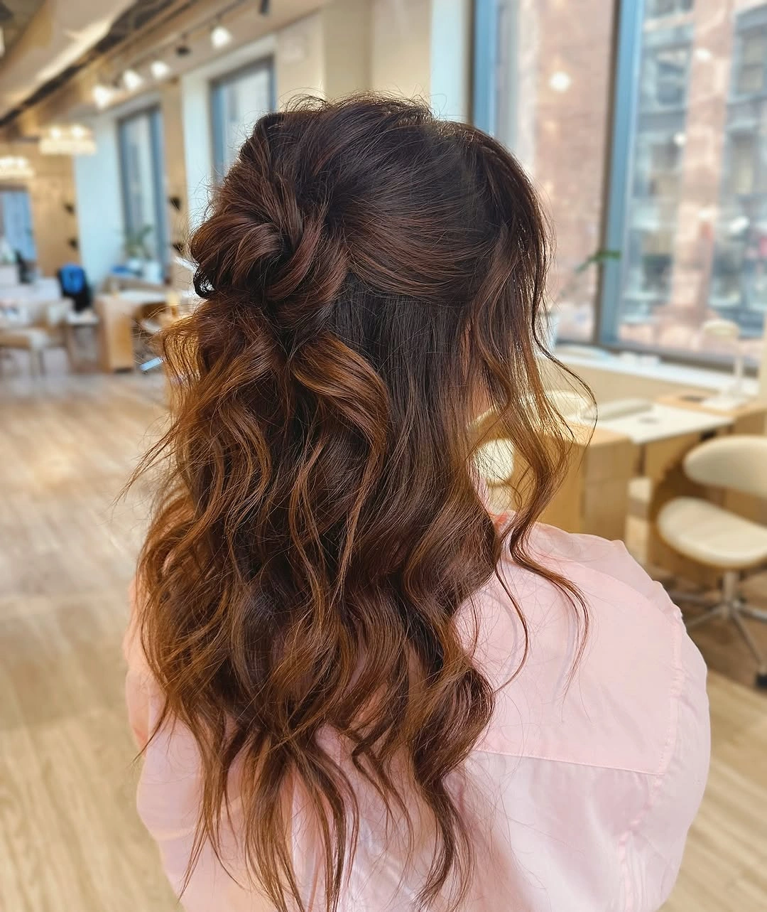 bridesmaid hairstyling Half Up Rosette Twist With Romantic Loose Waves