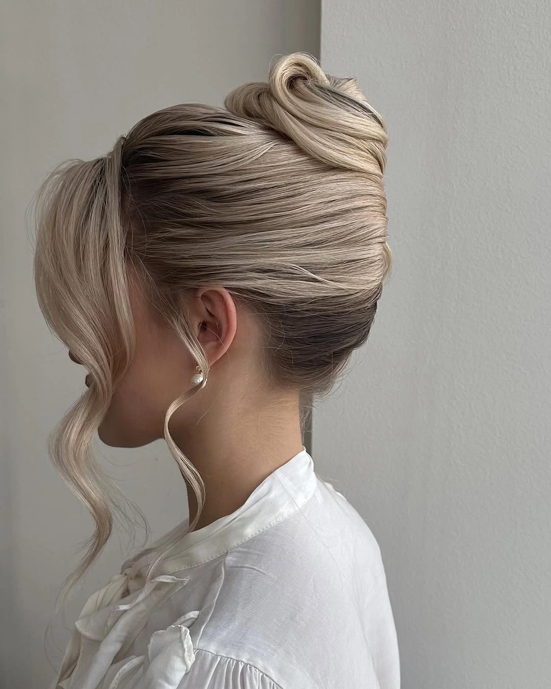 bridesmaid hairstyling Minimalist French Twist With Modern Elegance