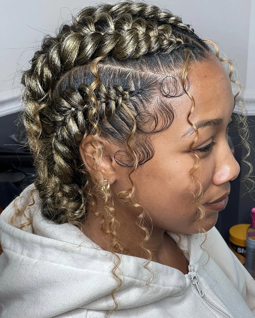 butterfly braids hairstyle Golden Butterfly Braids Styled Into a Chic Low Bun