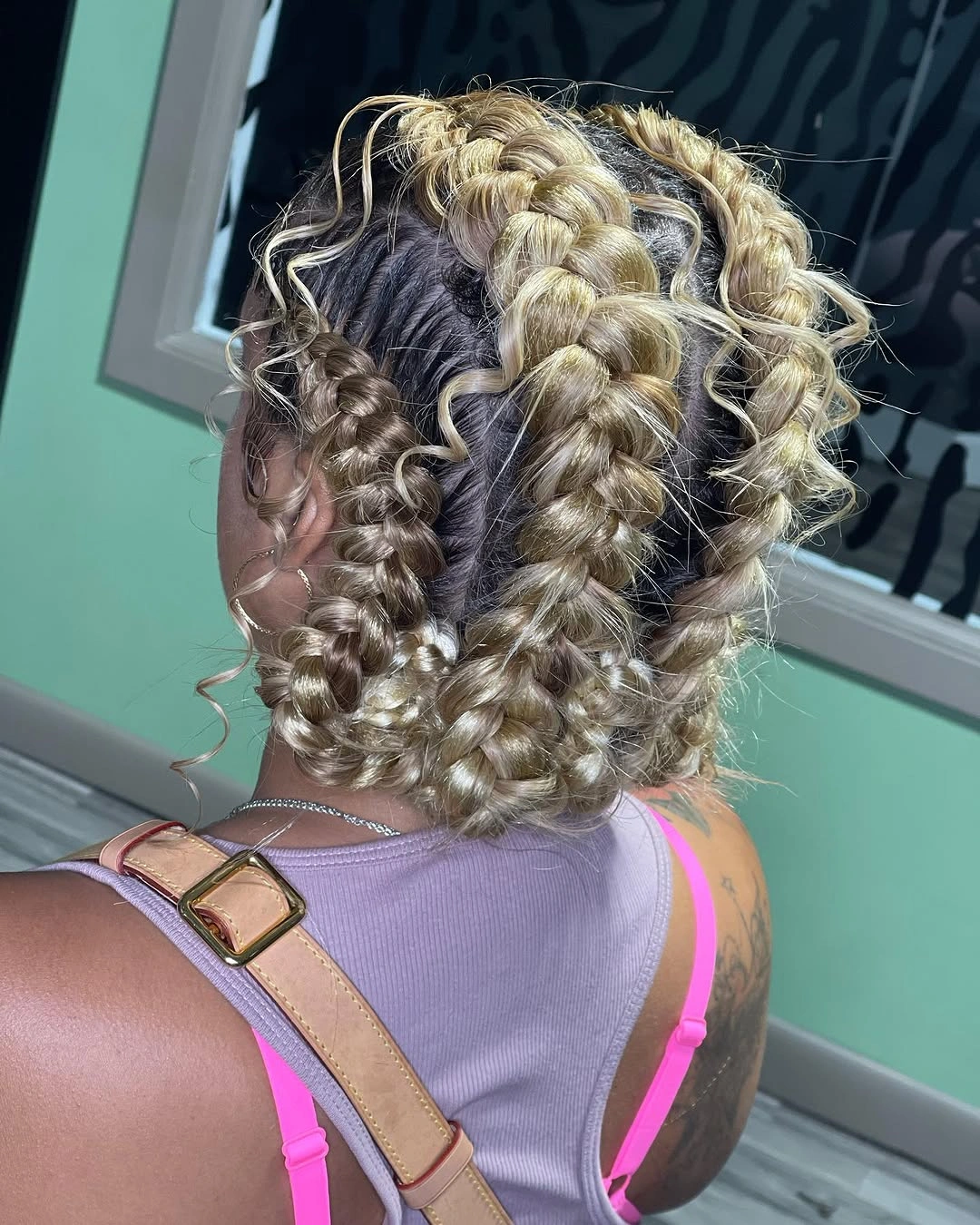 butterfly braids hairstyle Golden Butterfly Braids Styled Into Double Braided Buns