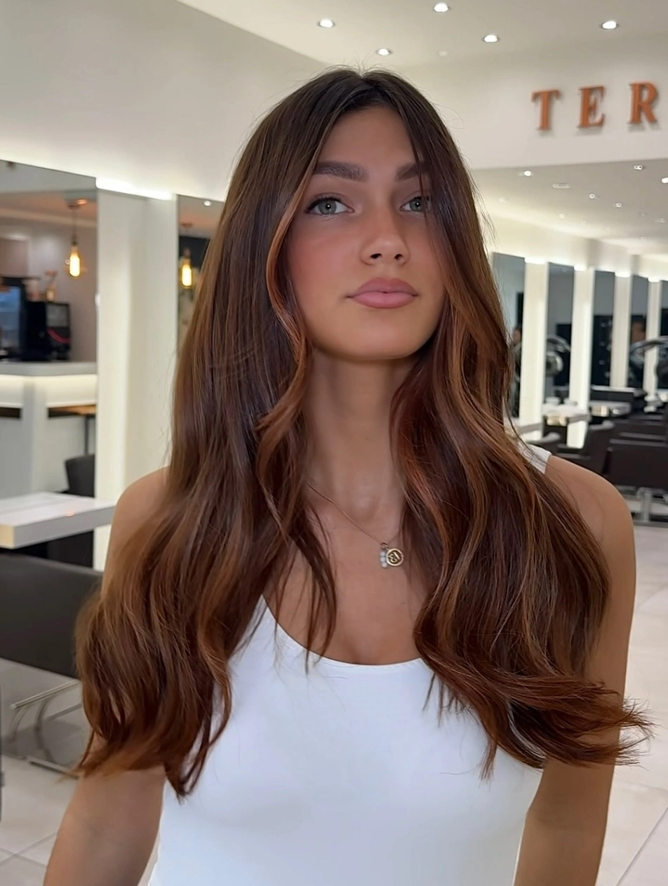 chestnut brown hair color Soft Auburn Chestnut With Natural Face-Framing Brightness