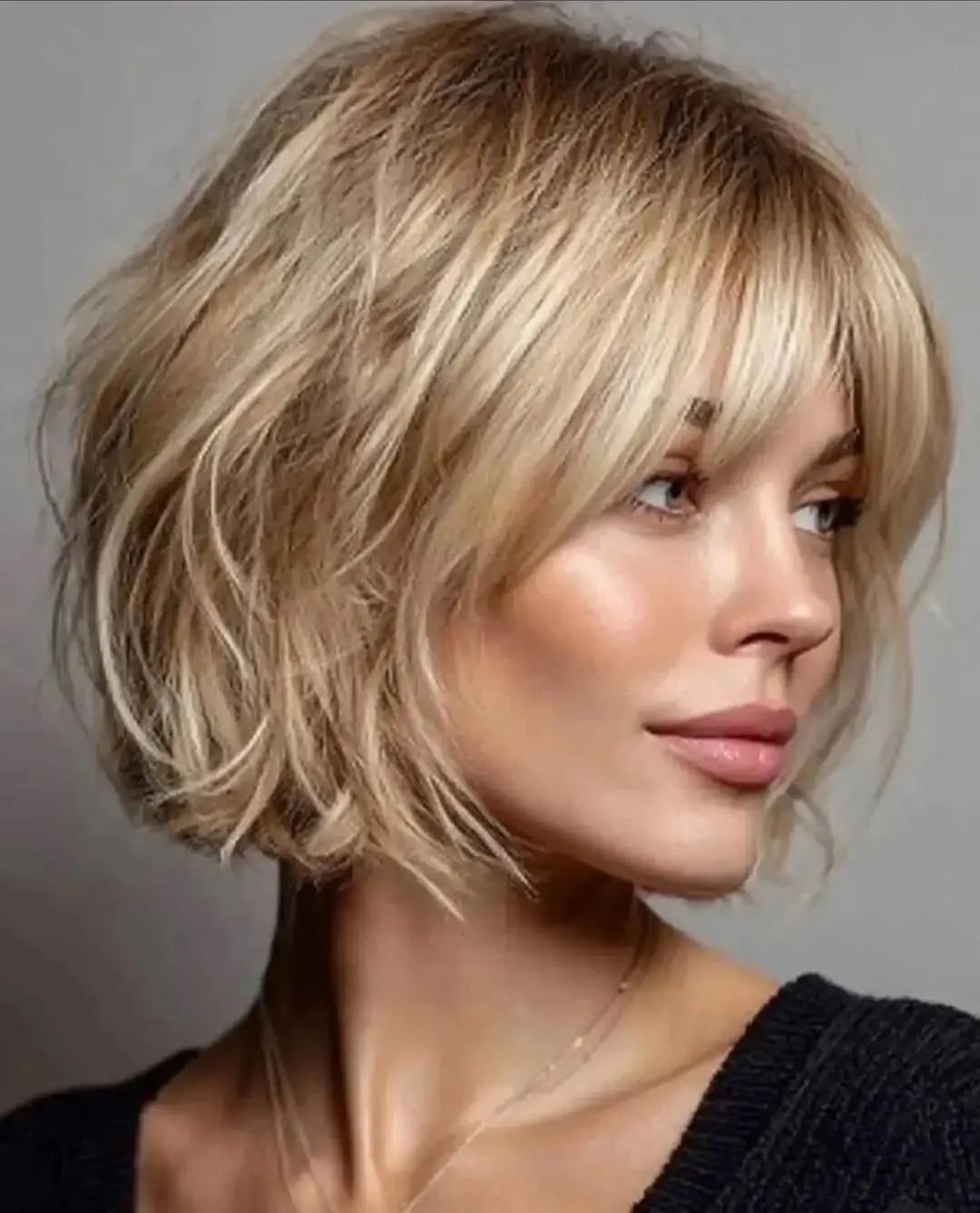 choppy medium layered hair Textured Blonde Bob With Soft Choppy Layers