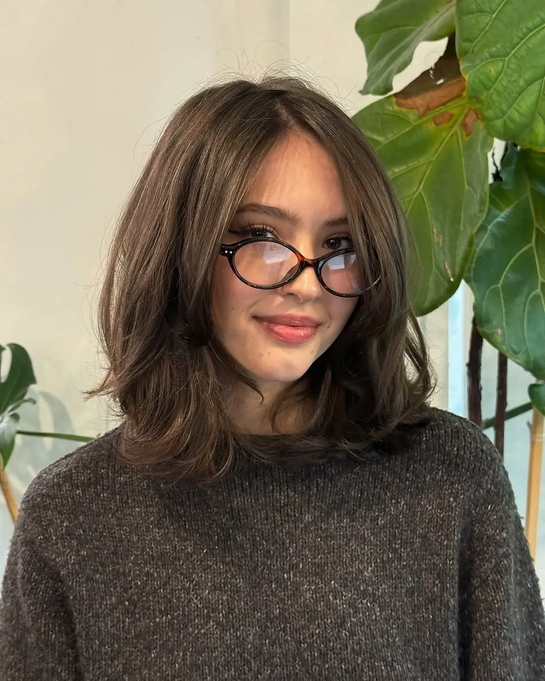 choppy medium layered hair Soft Brunette Layers With Youthful Face Framing