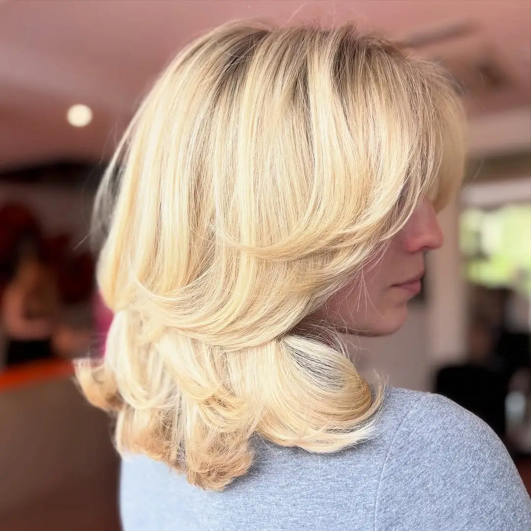 choppy medium layered hair Feathered Blonde Layers With Elegant Volume