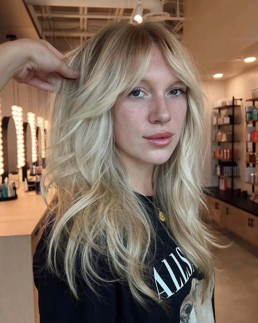 choppy medium layered hair Airy Blonde Layers With Modern Shag Influence