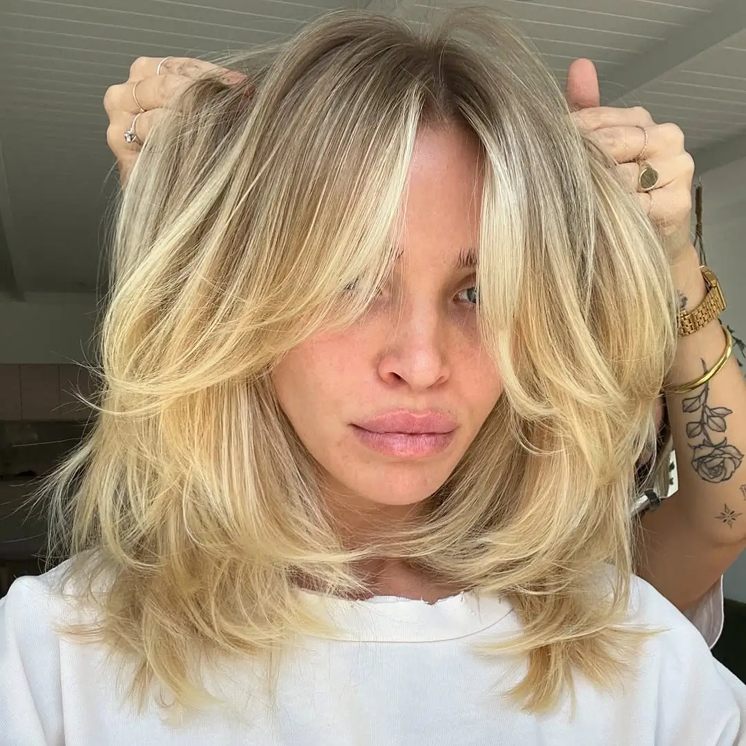choppy medium layered hair Voluminous Blonde Butterfly Layers