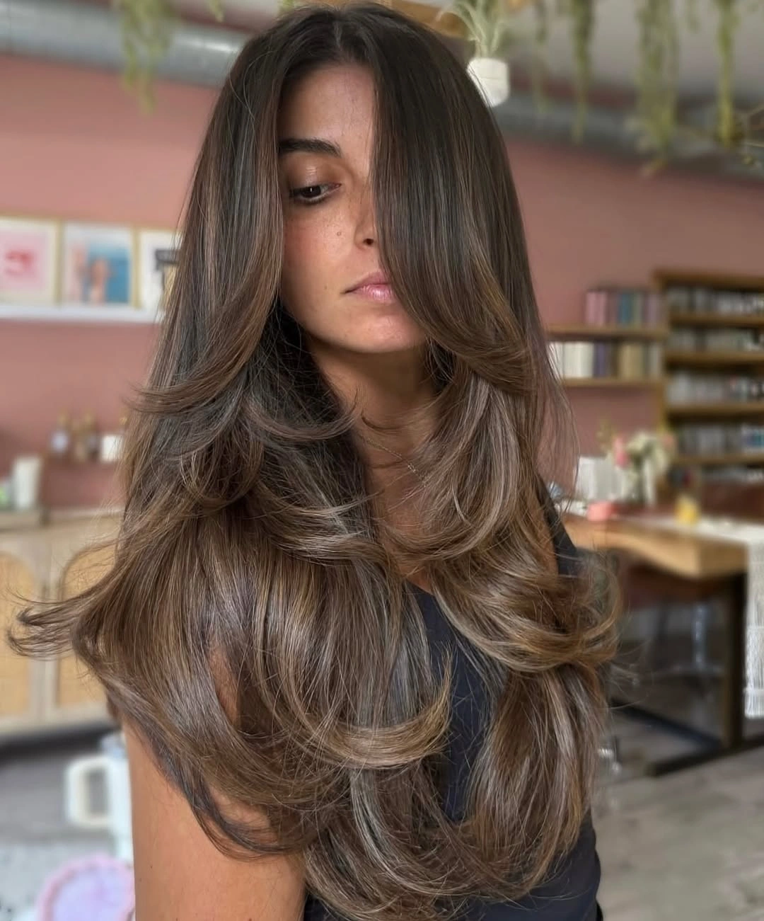 dimensional brunette hair color Feathered Mocha Brunette With Airy Face-Framing Layers