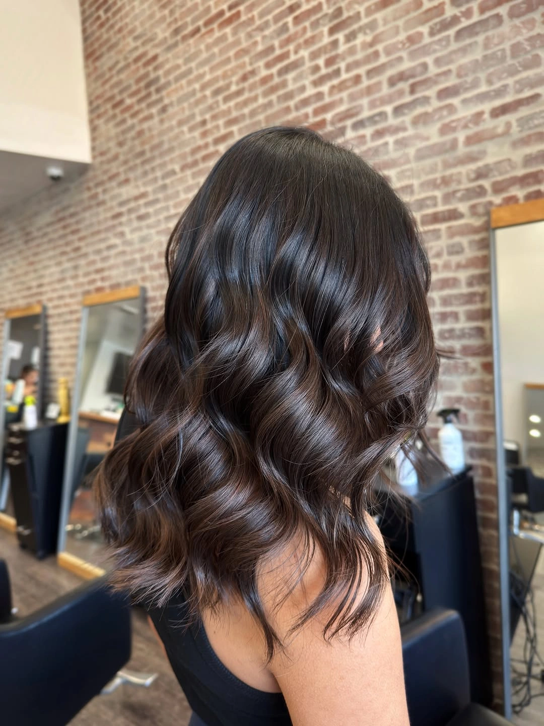 dimensional brunette hair color Dark Espresso Waves With Subtle Autumn Glow
