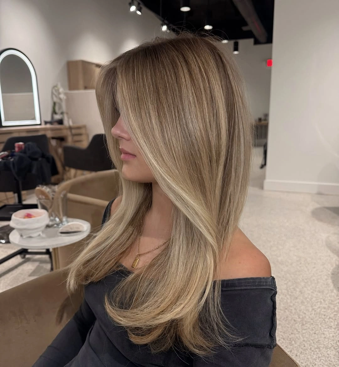 dirty blonde hair color Classic Dirty Blonde Blowout with Soft Curtain Layers