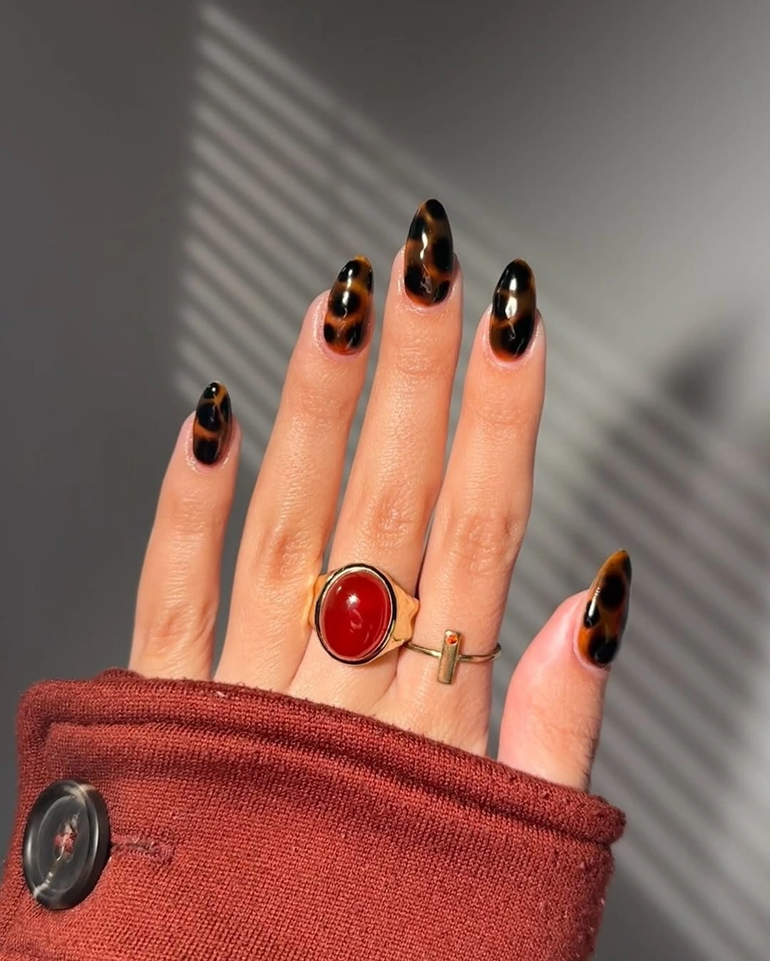 Fall acrylic nails 2026 Glossy Tortoiseshell Almond Nails That Define Fall 2026