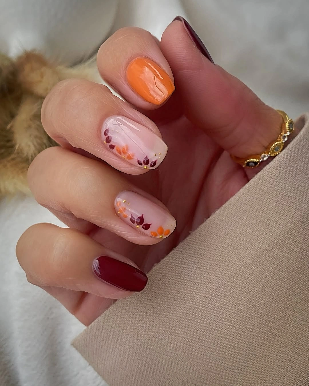 Fall acrylic nails 2026 Soft Autumn Floral Nails With Warm Harvest Colors