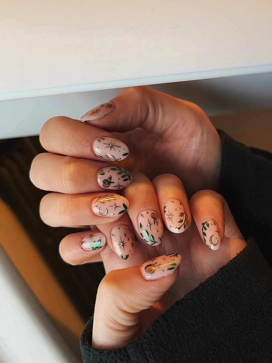 Fall acrylic nails 2026 Celestial Botanical Nails With Gold Moons and Olive Branches