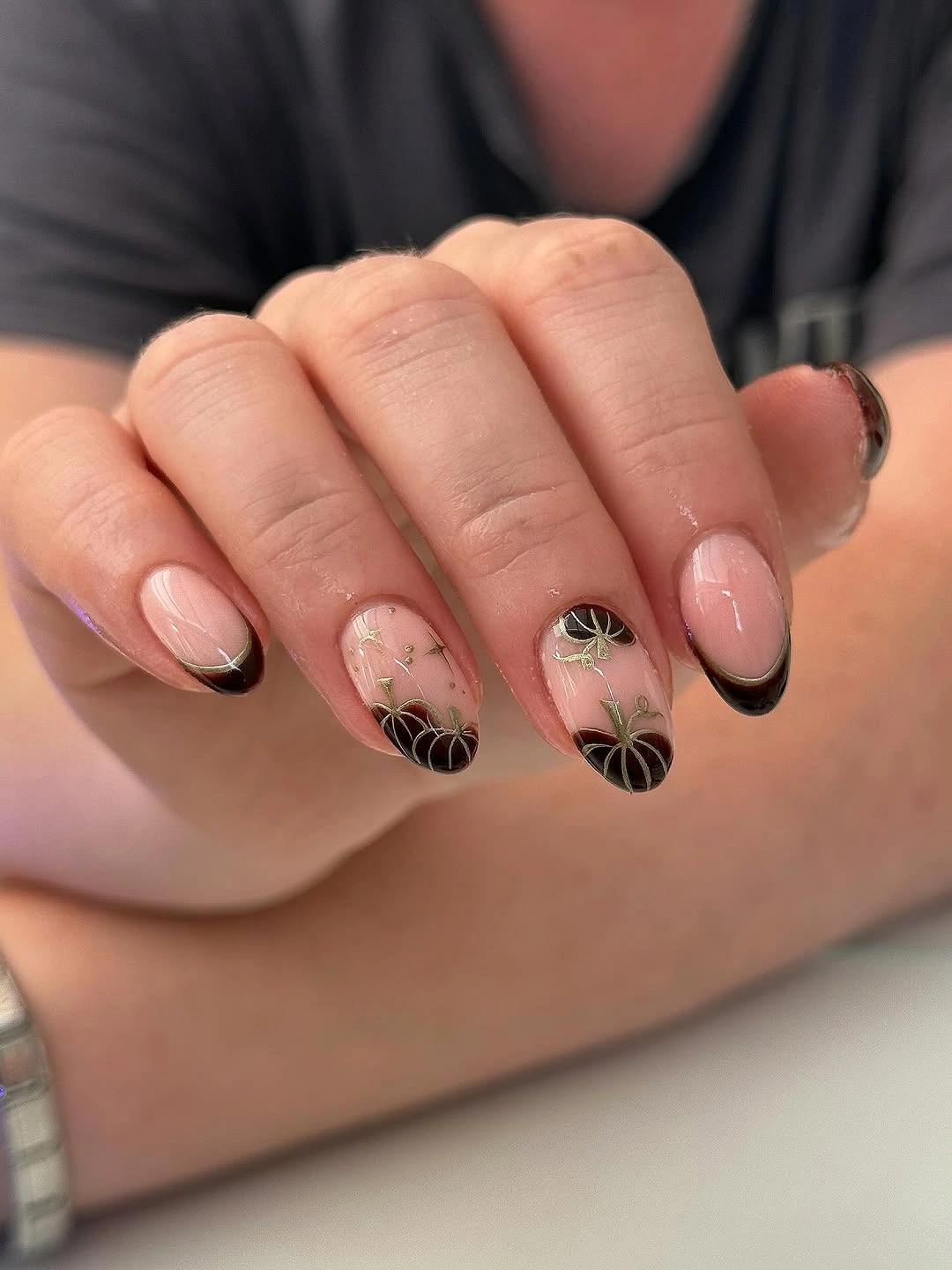 Fall acrylic nails 2026 Black French Pumpkin Nails With Chic Halloween Charm