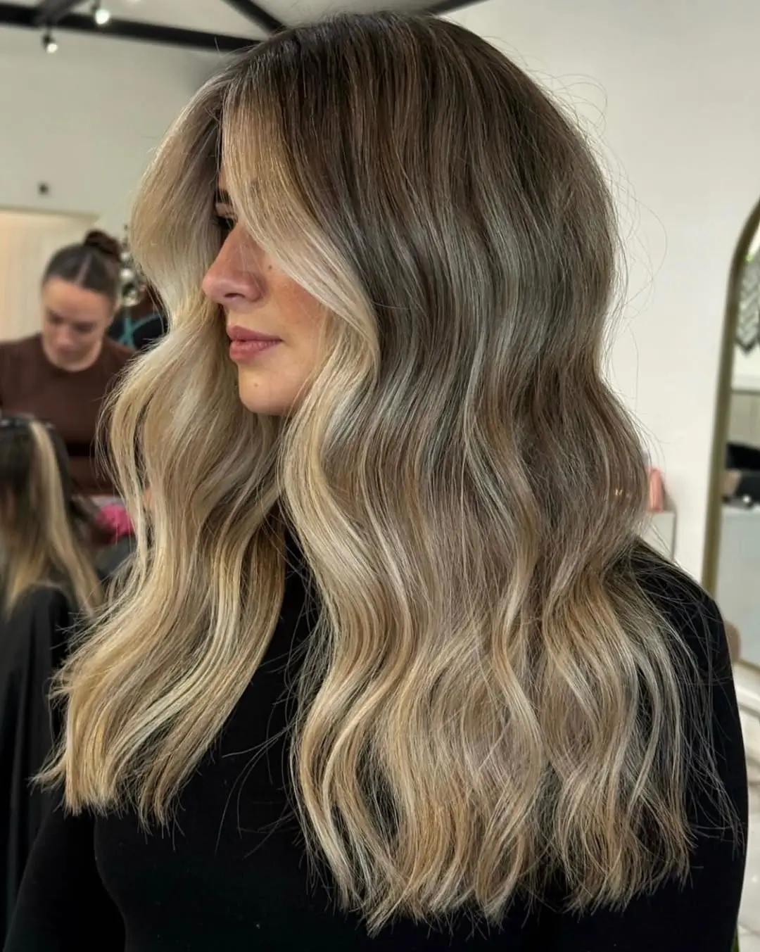 Fall blonde hair colour 2026 Soft Mocha Blonde With Face-Framing Brightness