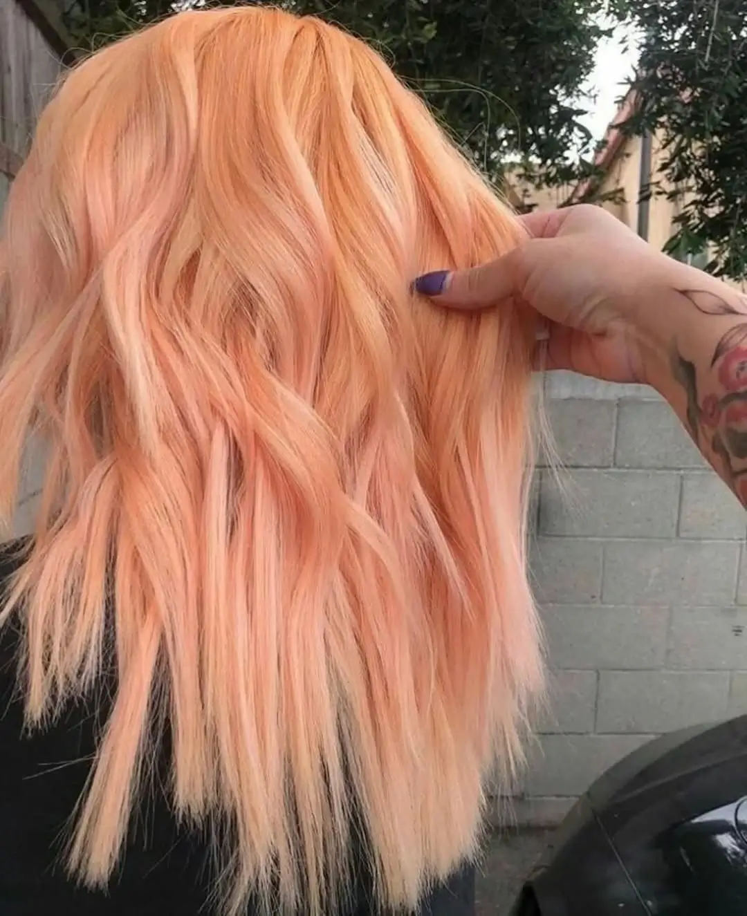 Fall blonde hair colour 2026 Soft Peach Blonde for a Playful Autumn Twist