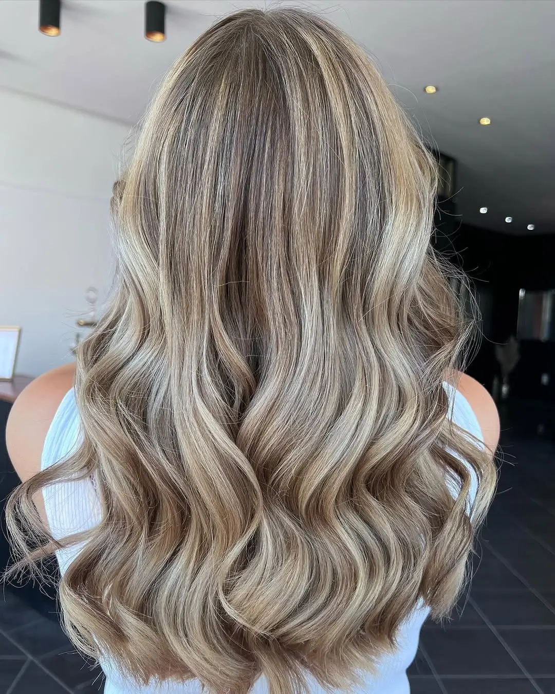 Fall blonde hair colour 2026 Mushroom Blonde With Silky Dimensional Waves