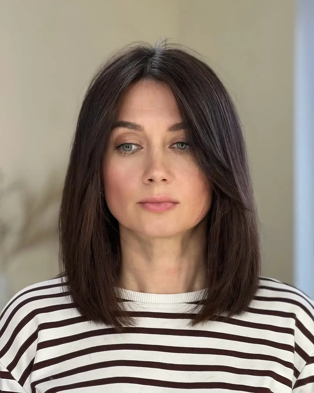 fall bob haircut ideas 2026 Soft Center Part Bob With Everyday Elegance