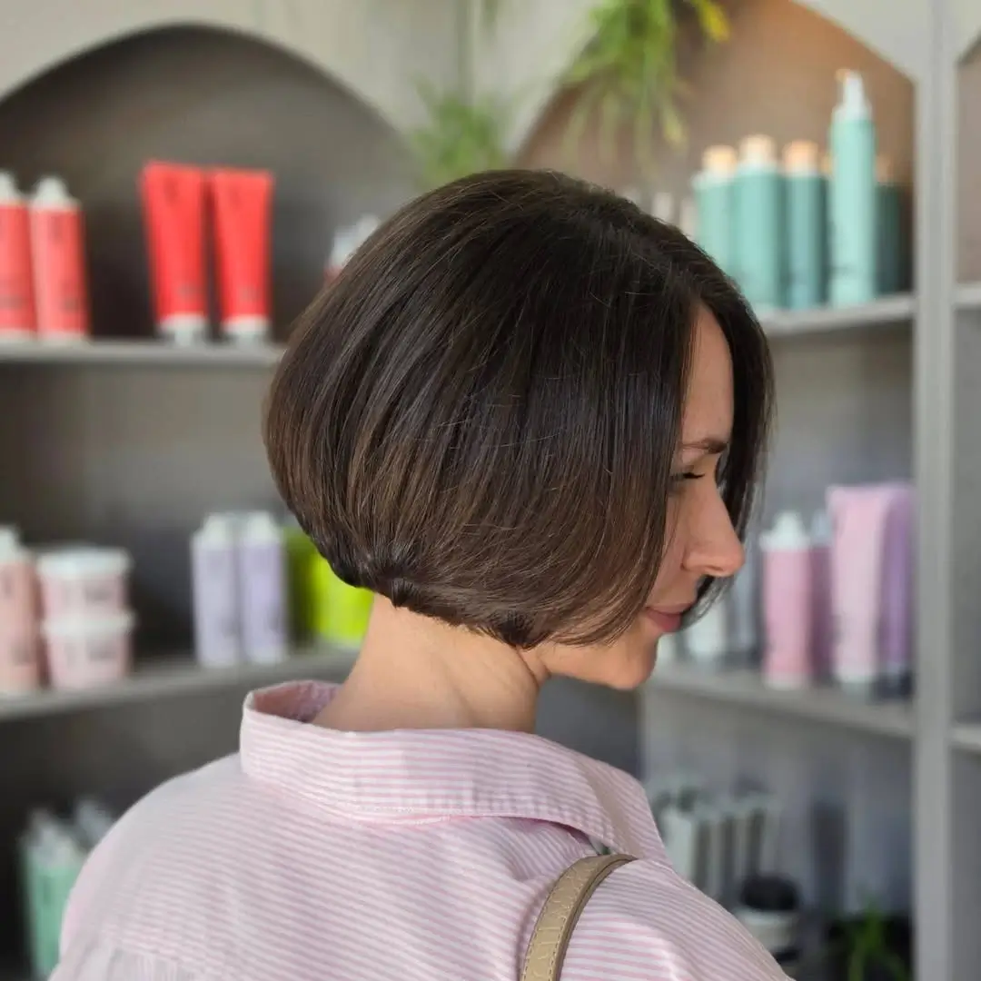 fall bob haircut ideas 2026 Rounded Brunette Bob With Soft Curtain Layers