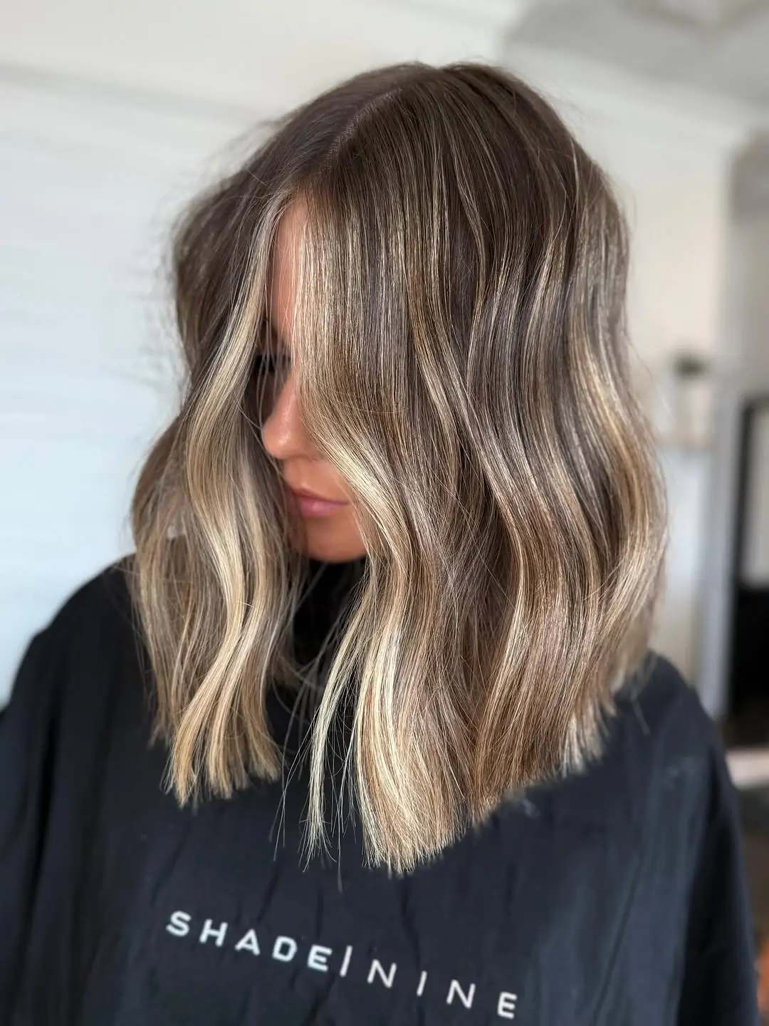 Fall brunette hair colour 2026 Cool Beige Bronde Bob with Bright Money Piece