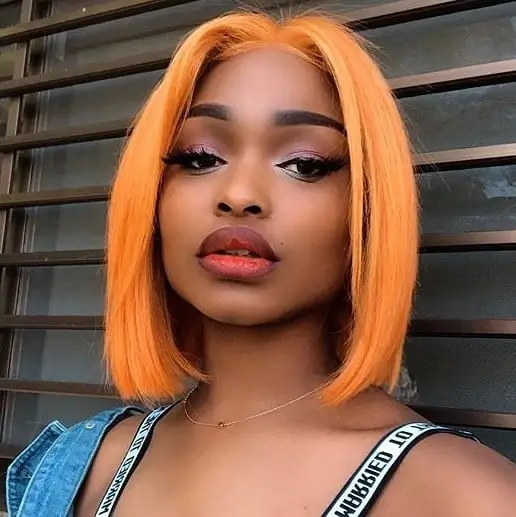 fall hair colors for black women 2026 Bold Pumpkin Orange Bob That Owns the Season