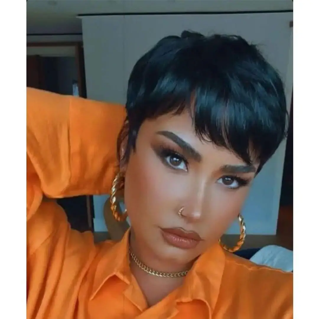 fall hair colors for black women 2026 Glossy Jet Black Pixie With Timeless Elegance