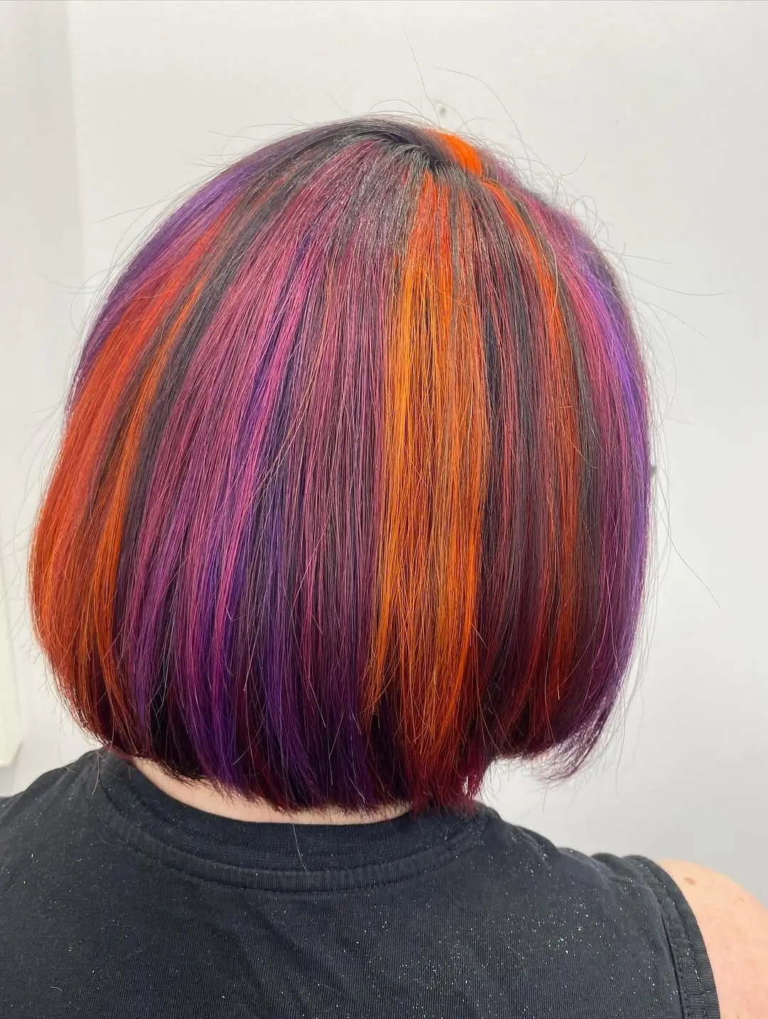 Fall hair colour ideas 2026 Electric Sunset Panels On A Sleek Bob