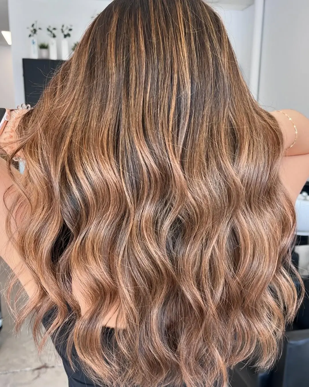 Fall hair colour ideas 2026 Toasted Caramel Balayage With Espresso Roots
