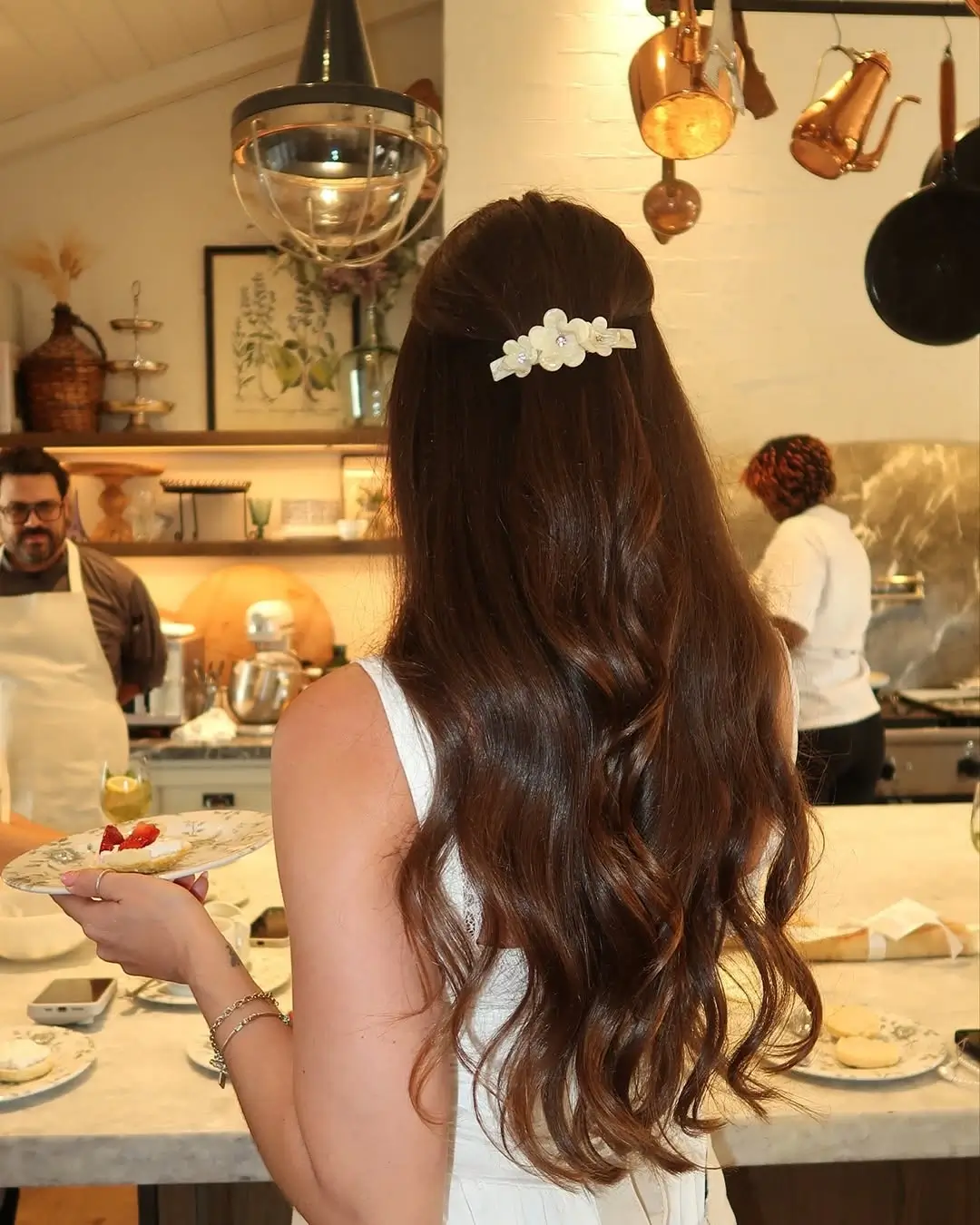 fall hairstyles 2026 Elegant Pearl Barrette with Soft Brunette Waves
